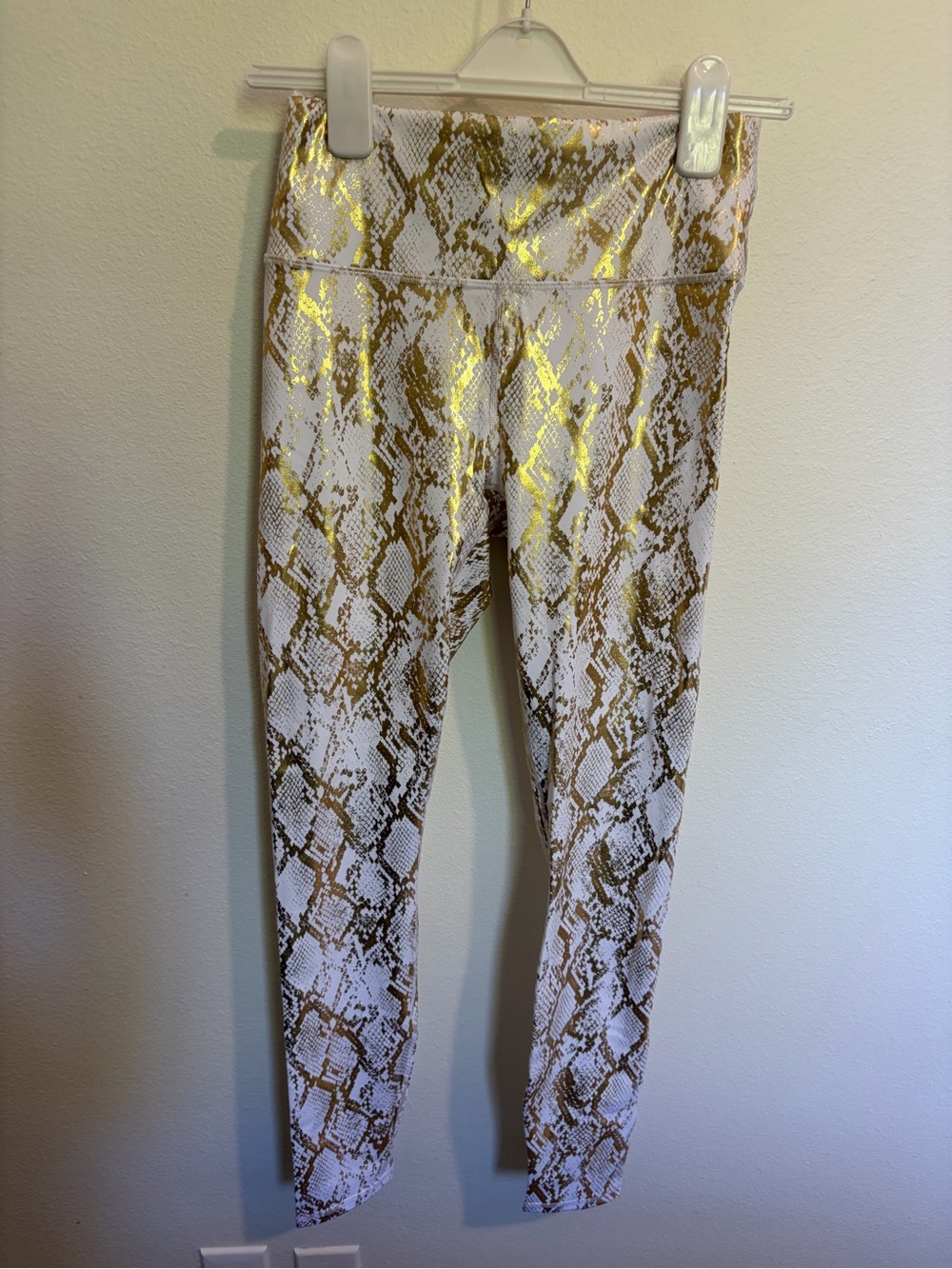 Shinny white and gold leggings